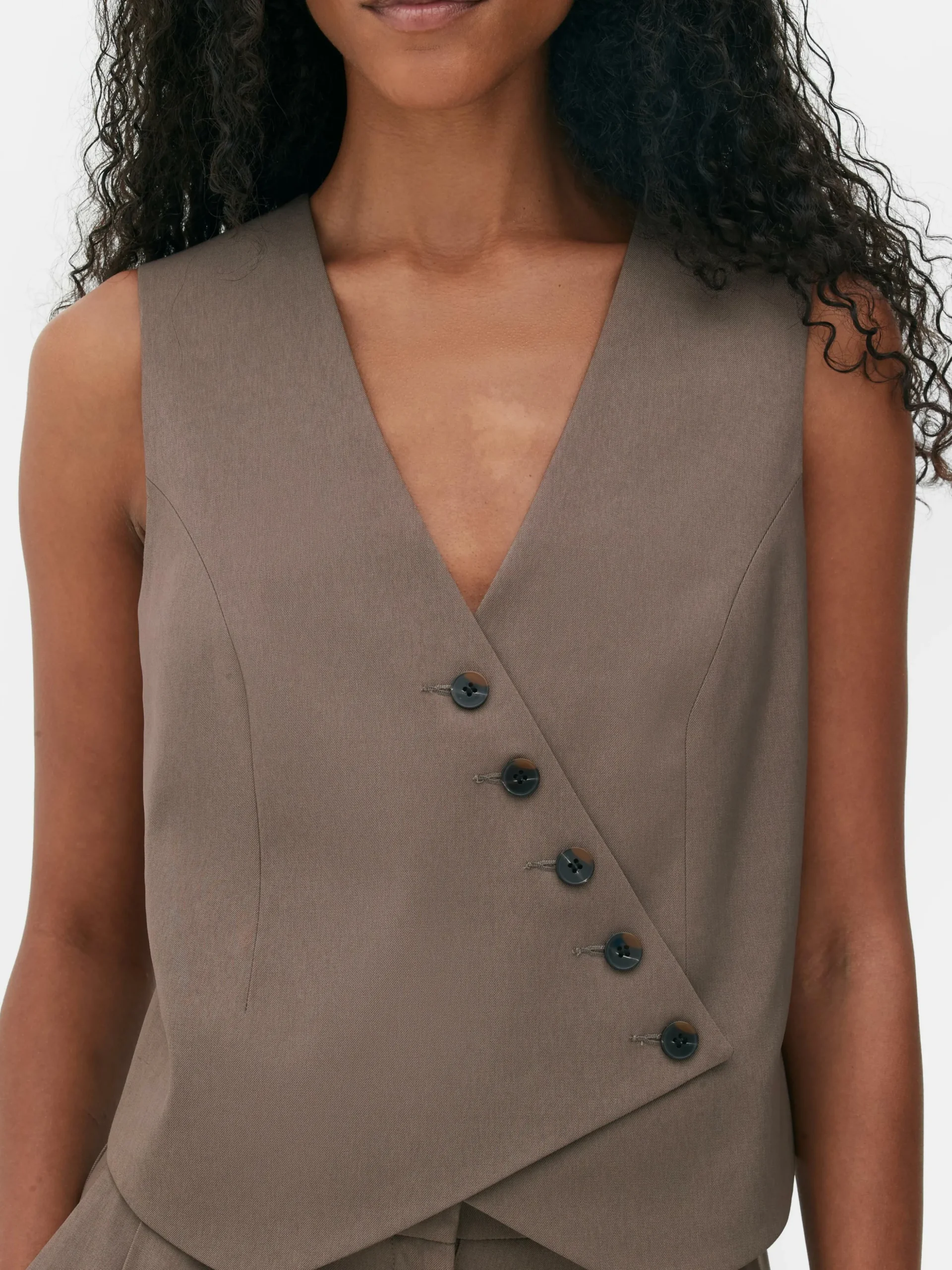 Asymmetrisch Gilet Met Knopen Aan De Voorkant