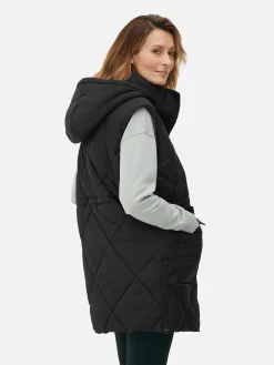 Lange Pufferbodywarmer Met Capuchon