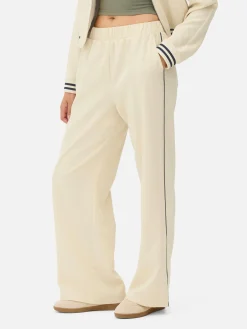 Matchende Joggingbroek Met Wijde Pijpen En Zijstreep