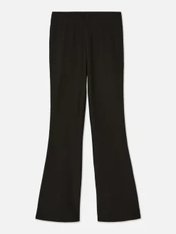 Ribbroek Met Wijduitlopende Pijpen