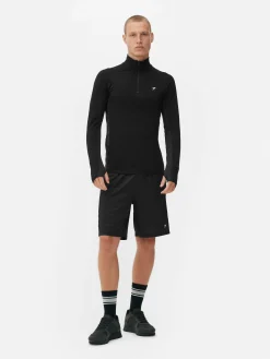 Sporttop Met Kwartrits En Lange Mouwen